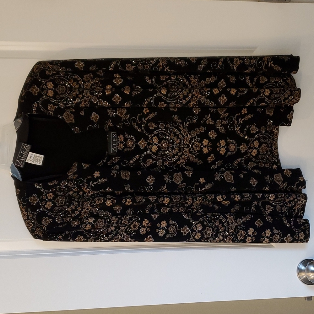 Evening jacket with matching tank top.